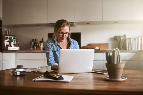 Home worker in kitchen image